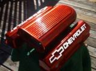 Chevy valve covers and dual quad hood scoop in Wilder Red over Super Chrome