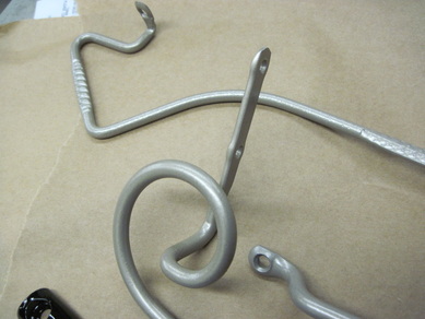 Close up of antique doctor's cutter sleigh parts in GM Silver and Ink Black (parts circa 1890)