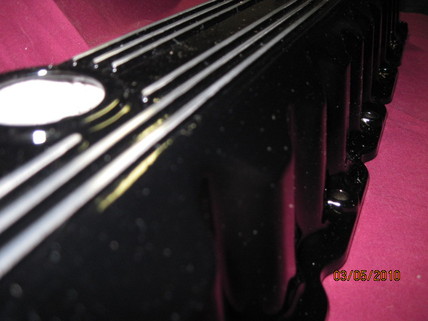Close up of Jeep valve cover in Ink Black