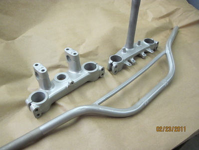 Honda triple trees and handlebars in Silver Glaze