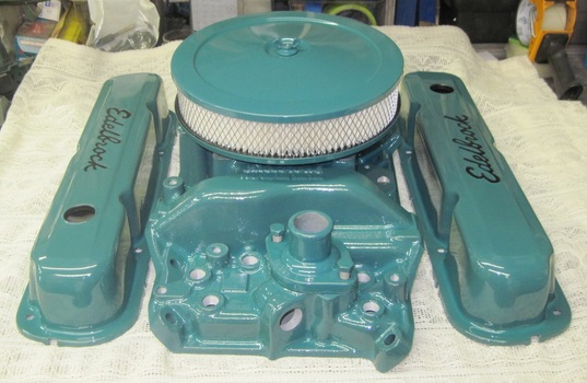 Small block Mopar Edelbrock valve covers, intake manifold and air cleaner in Sea Water Teal and Clear Vision