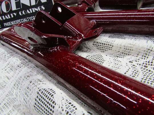 Suzuki drag bike frame close up in Blue Explosion over Black Pearl